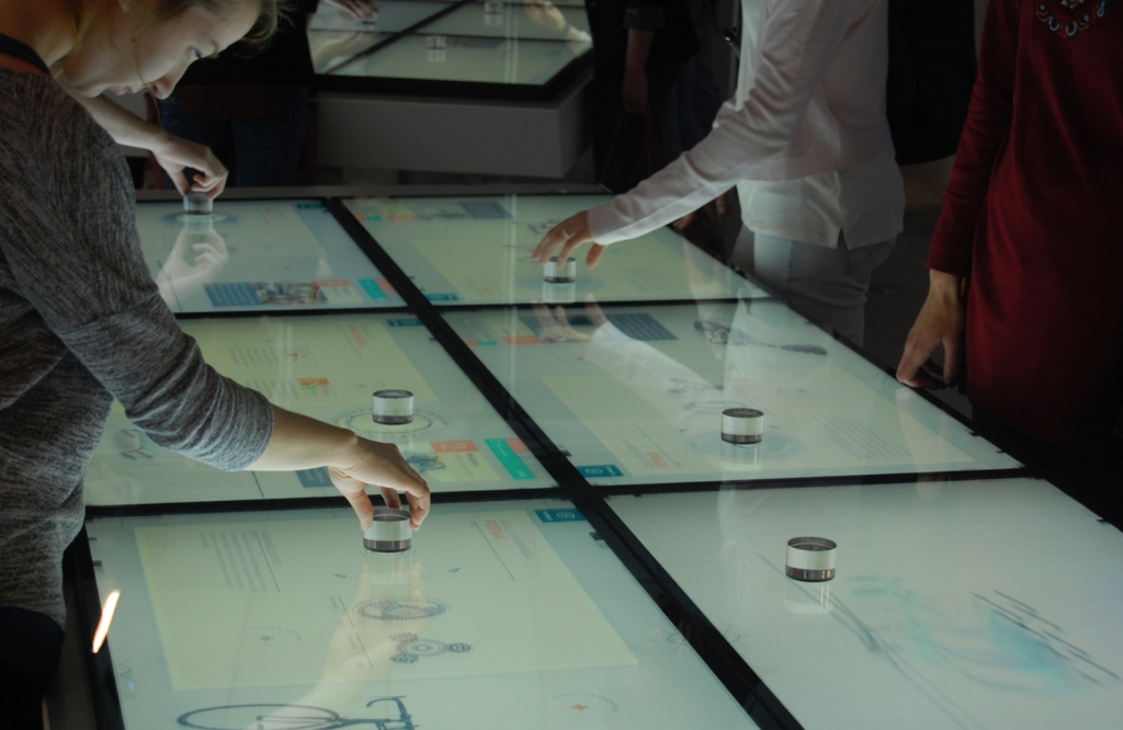 Physical installations — Interactive kiosks and spatial journeys